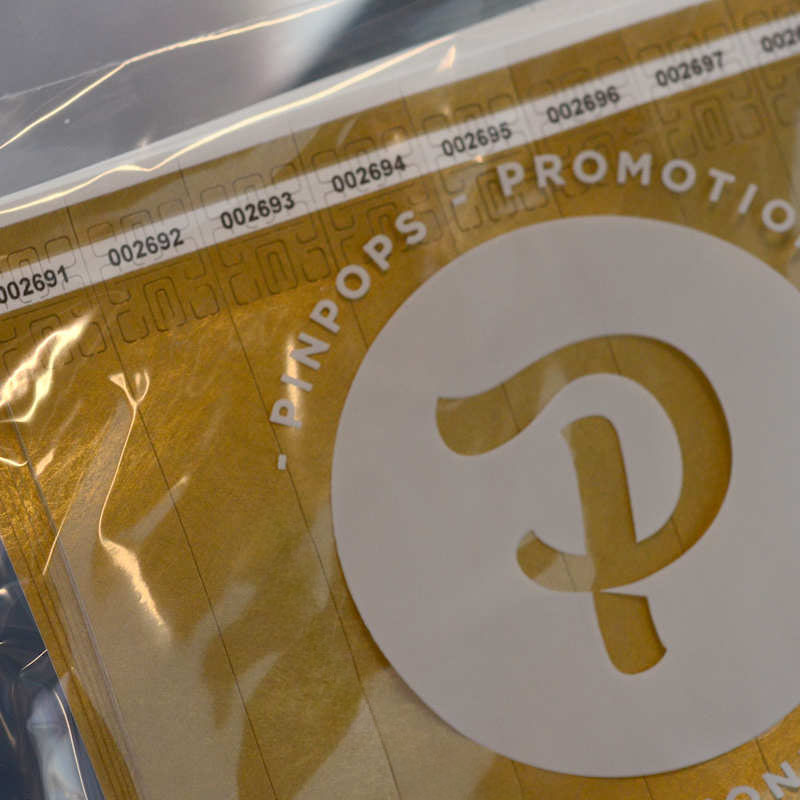 Gold metallic Tyvek Tens wristband with a permanent closure. Prenumbered in sequential order.