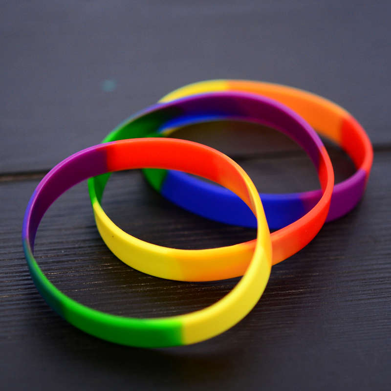 Pride Flag Colours Silicone Wristband stock model at 202x12mm