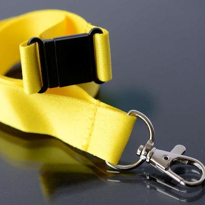 Yellow 20mm flat polyester satin lanyard with safety buckle and trigger snap swivel hook