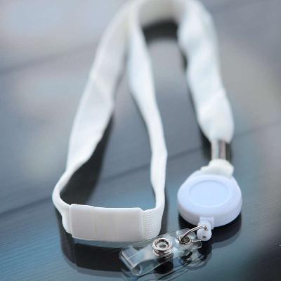 White 16mm flat polyester lanyard with safety buckle with white badge reel with vinyl strap