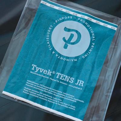 Teal Tyvek Tens wristband with a permanent closure. Prenumbered in sequential order.