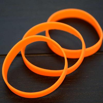 Orange Silicone Wristband stock model at 202x12mm