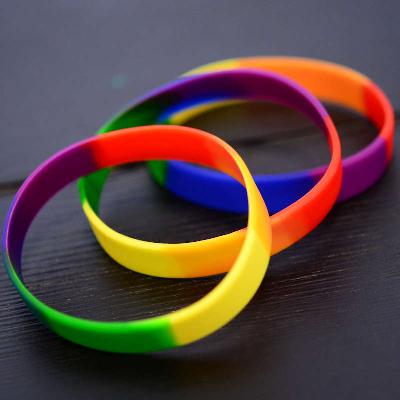 Pride Flag Colours Silicone Wristband stock model at 202x12mm